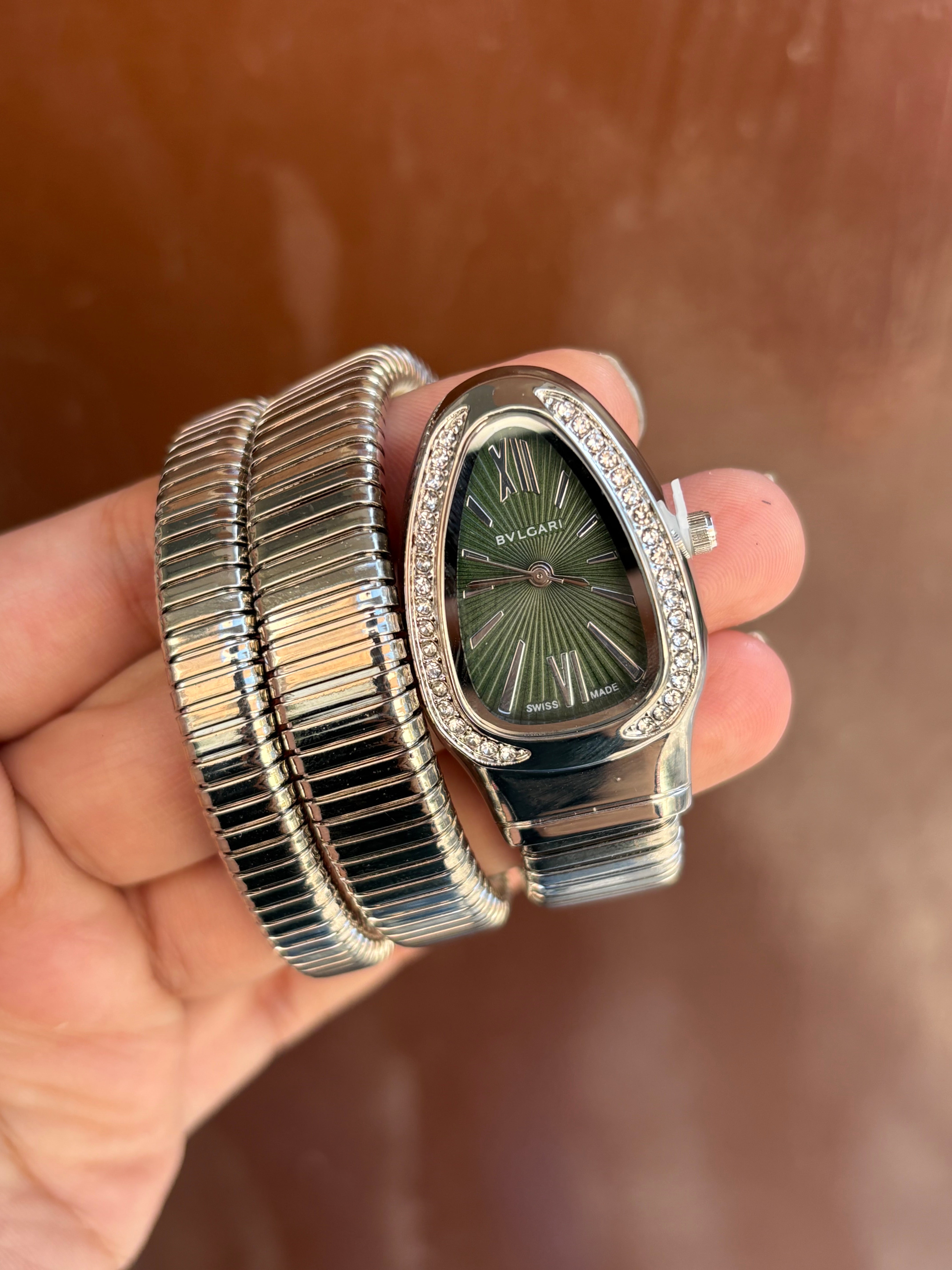 Silver Spiral watch with green dial