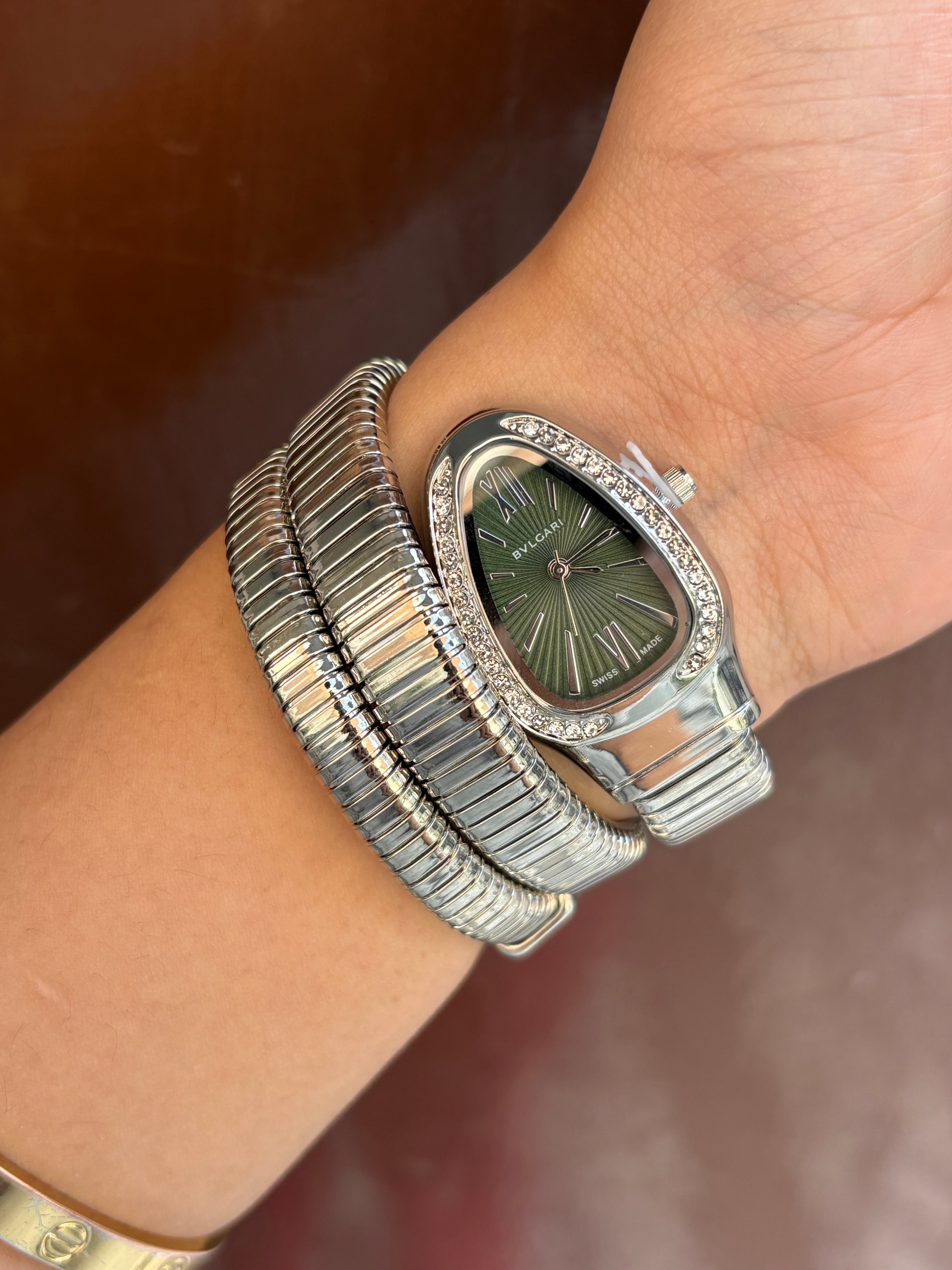 Silver Spiral watch with green dial
